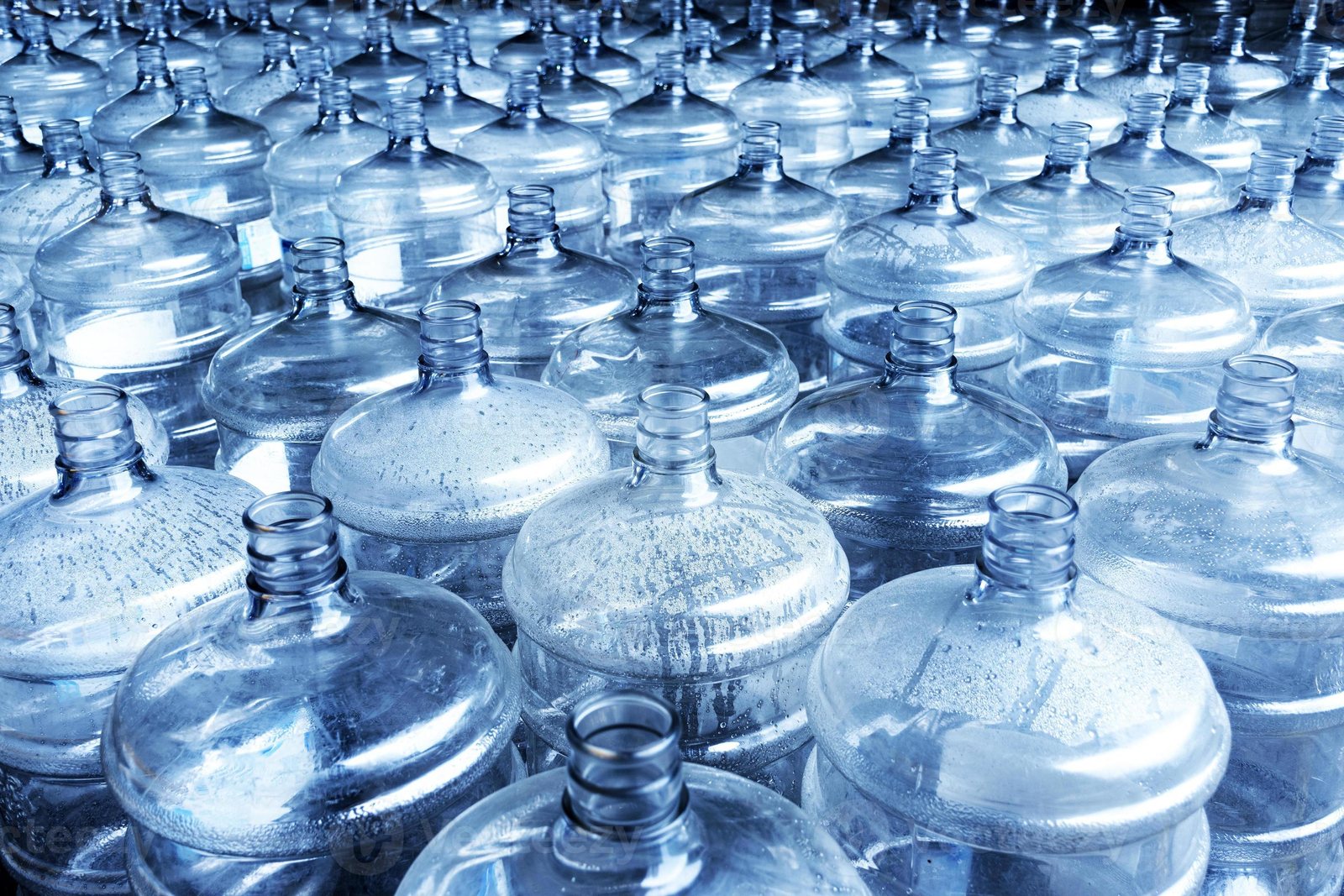 Stacks of 19-litre water bottles